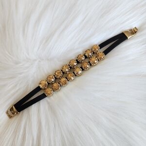 Black leather bracelet with brown crystals